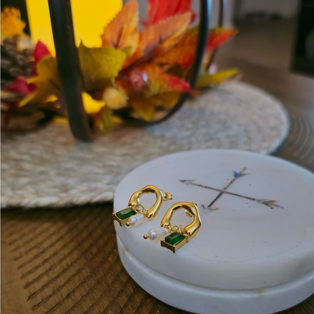 Brand new gold plated dangling earrings with emerald stone